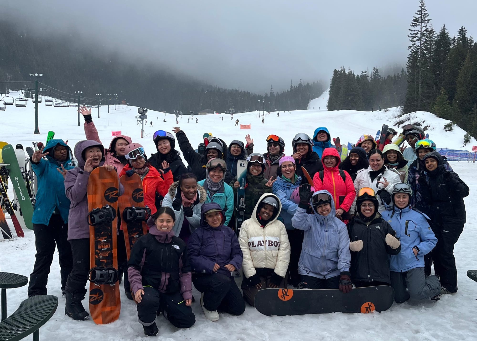 Edge Outdoors group photo at Crystal Mountain with women of color on skis