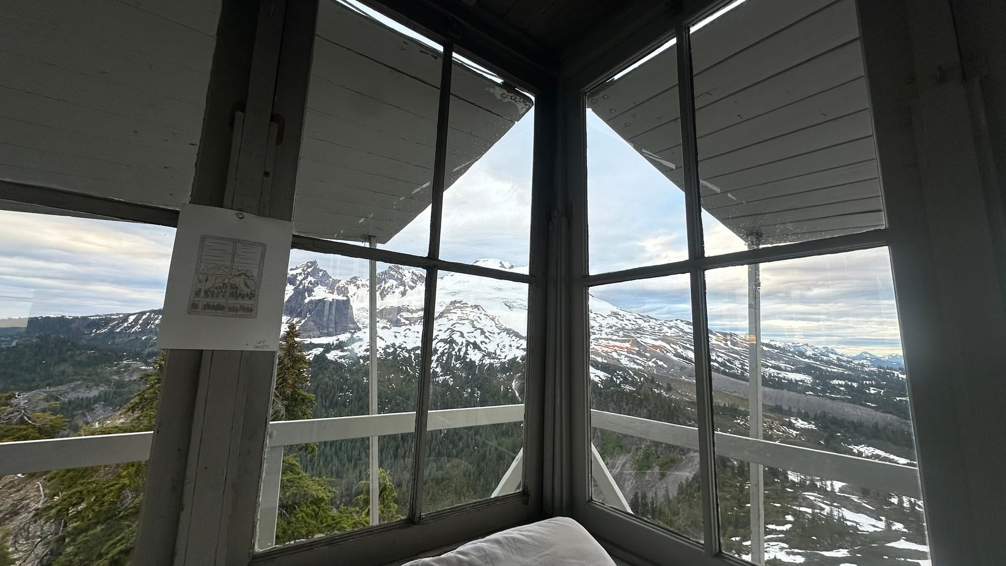Corner of the lookout interior looking out at Mt. Baker in the morning light