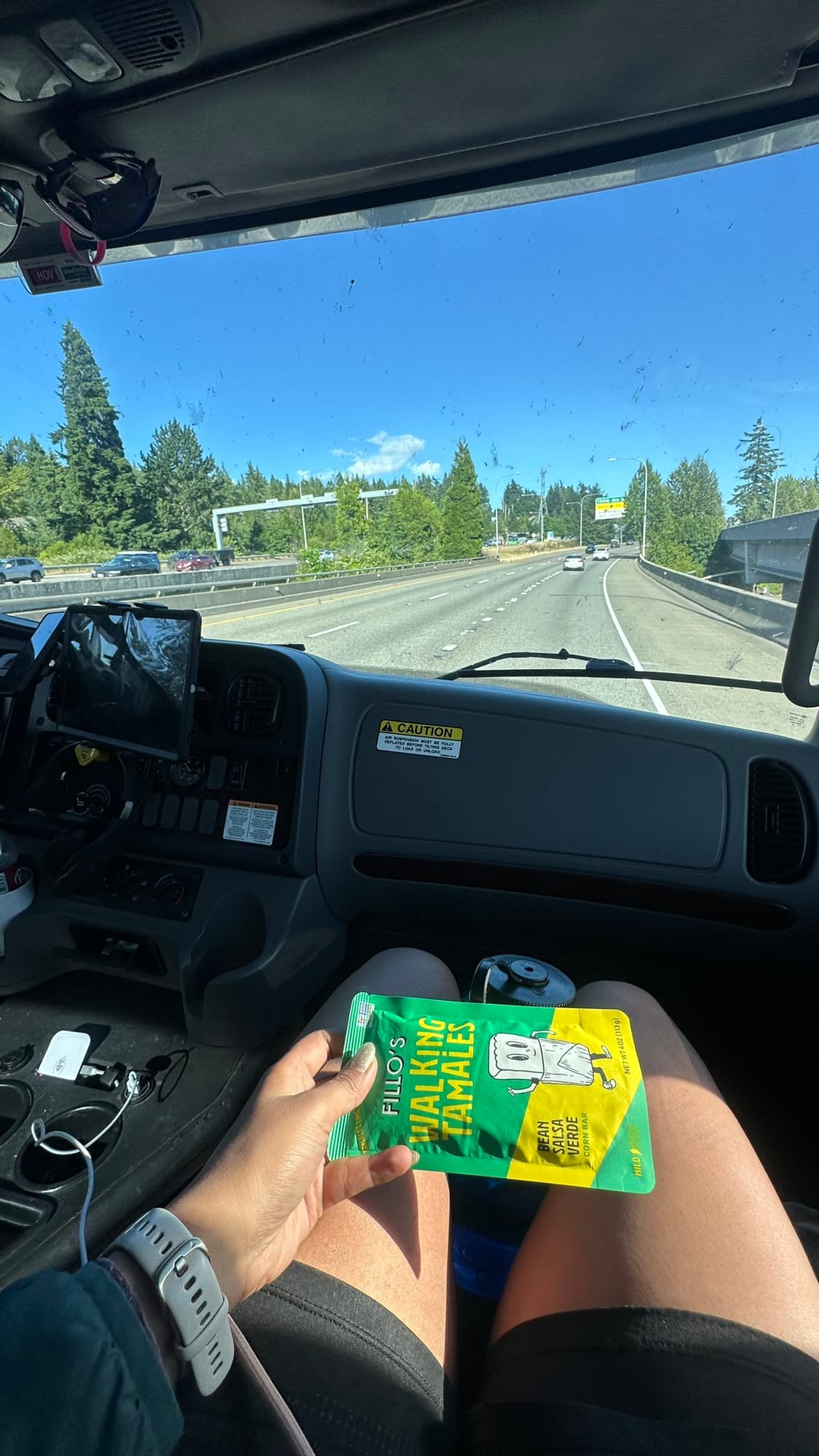 Eating walking tamales in the tow truck on the highway back to Bellevue