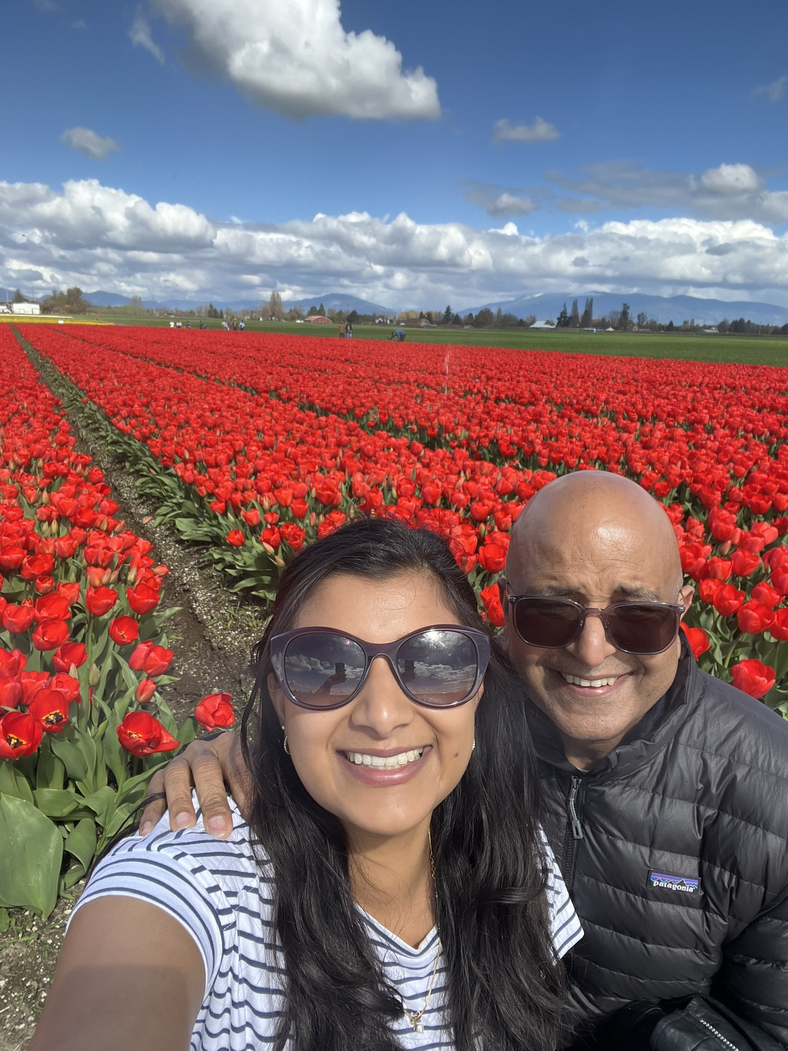 Selfie with my dad in front of a massive field of red tulips